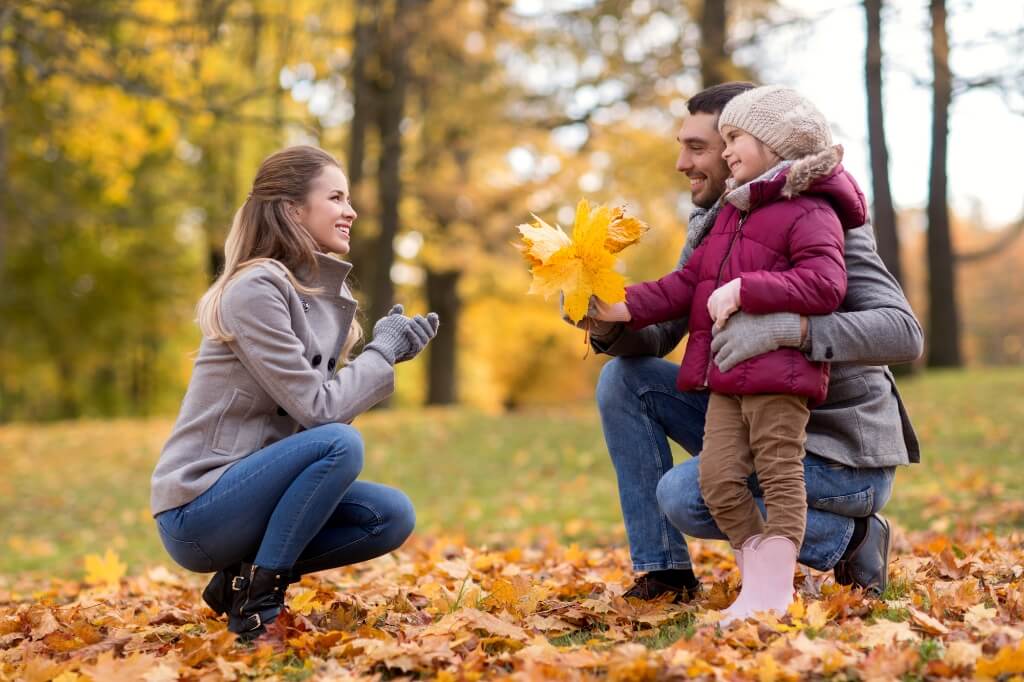 Parents Enjoying With Their Child