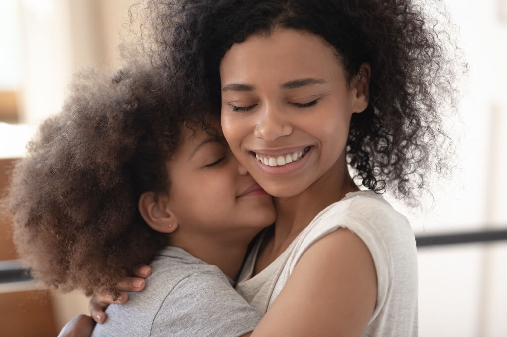 Daughter Smiling With Her Mom