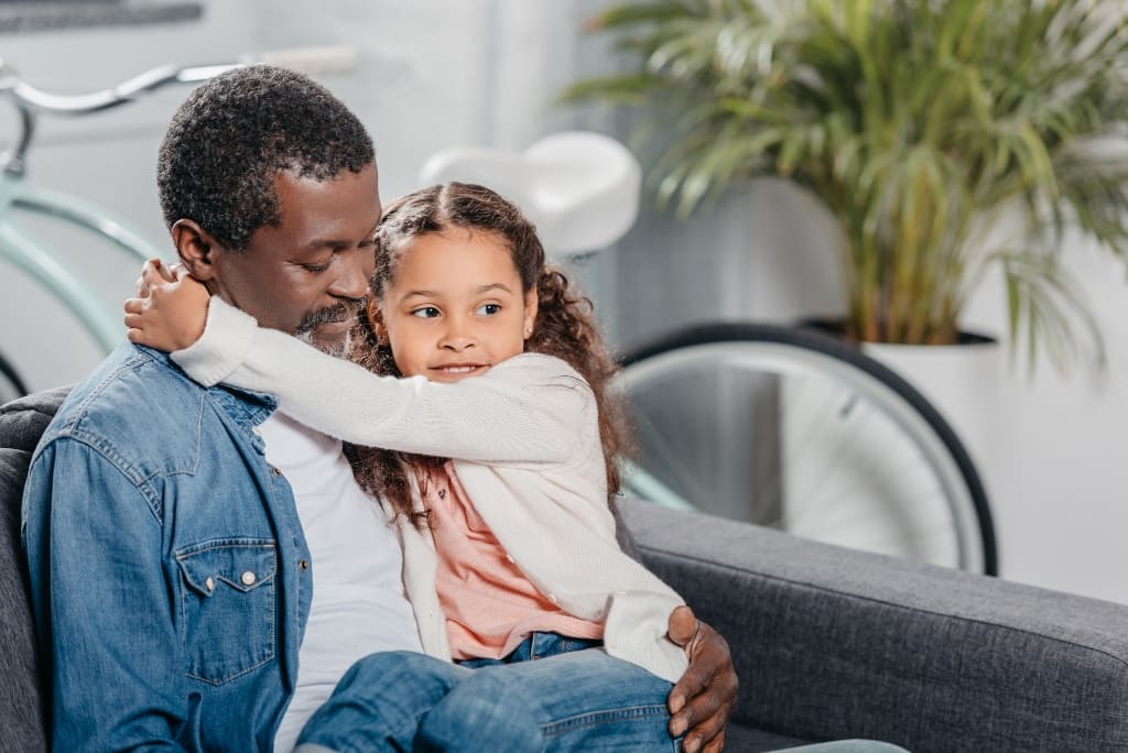 Daughter Smiling With Her Dad