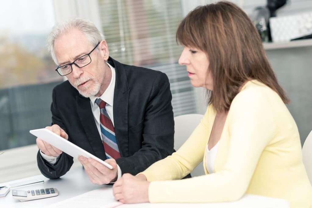 Lawyer Discussing With His Client